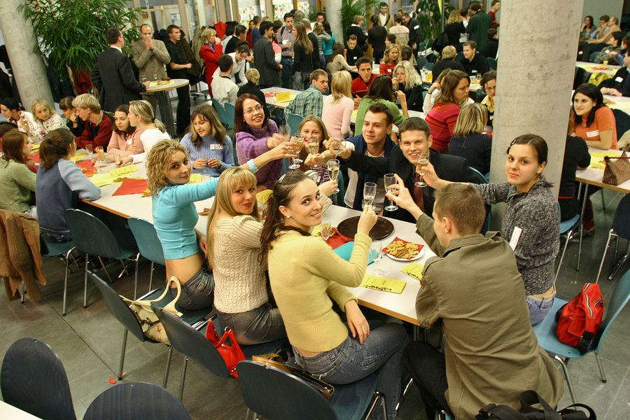 In the foyer of the Gräfin-Dönhoff building, students from the European Humanities University Minsk (EHU) toast each other on 20 October 2004.